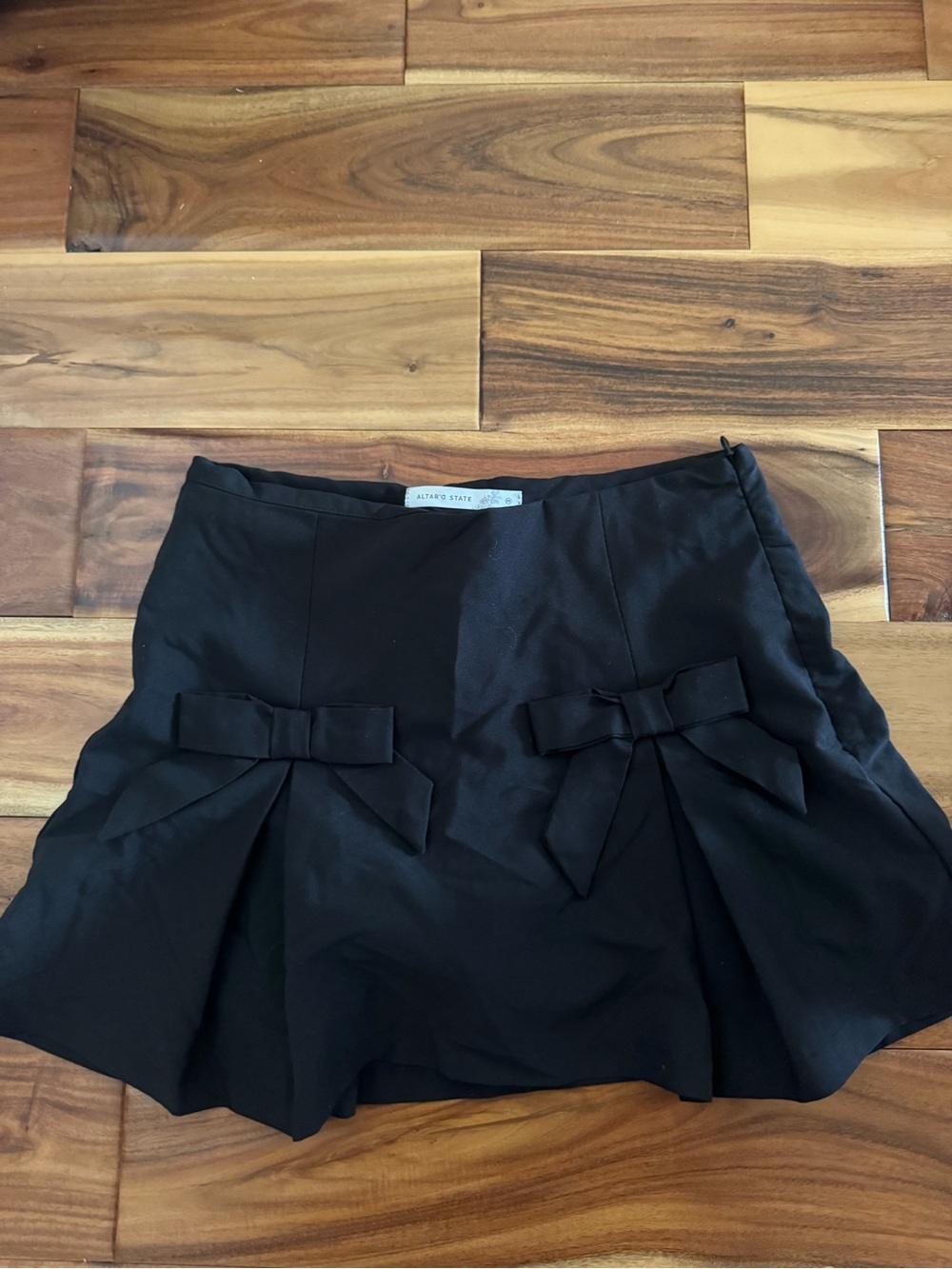 Black Altar’d State Mini Skirt with Decorative Bows